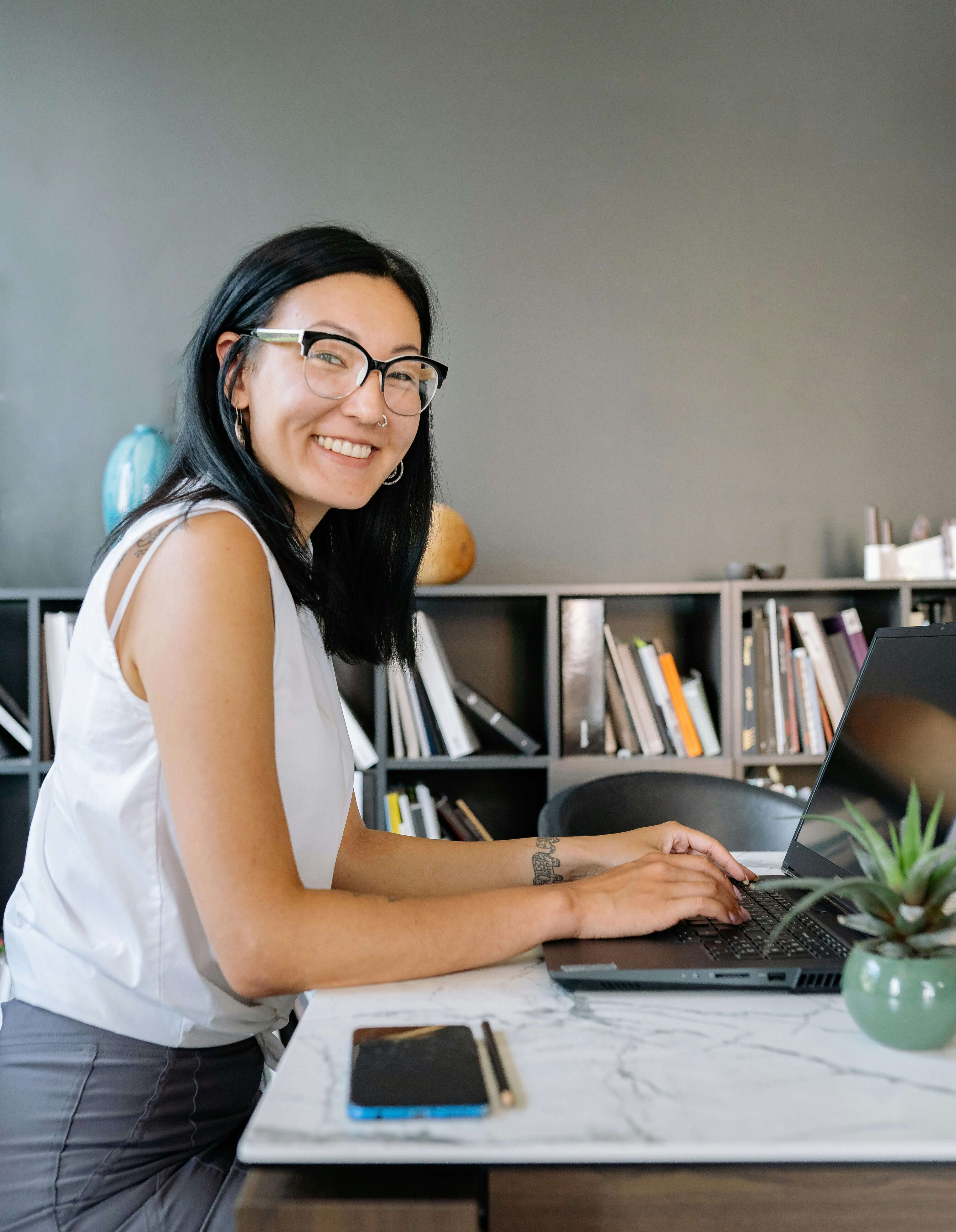 Filipino creative design team in modern office environment
